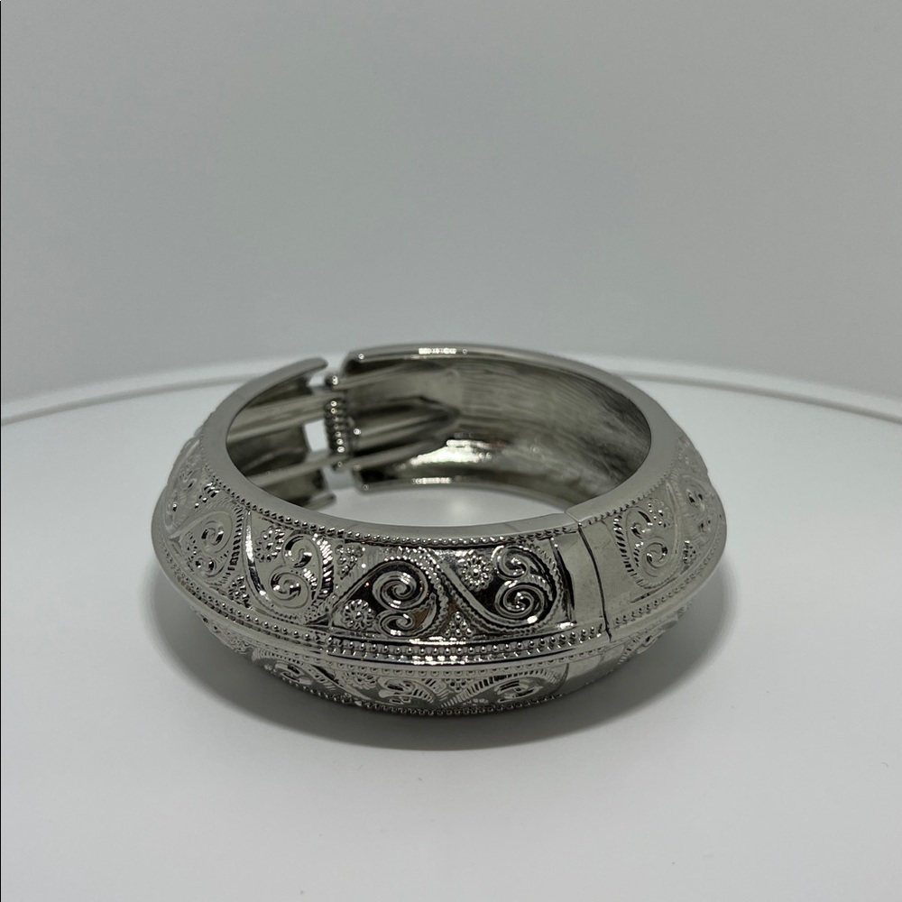 Ornate Silver Bracelet with Swirl Design